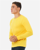 Pretreated BELLA+CANVAS 3501CVC Heather CVC Long Sleeve Tee - Heather Yellow Gold - On Model - Side