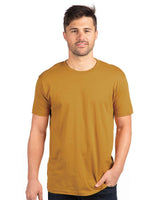 Pretreated Next Level 3600 Unisex Cotton Short Sleeve Crew - Model wearing Antique Gold color shirt.