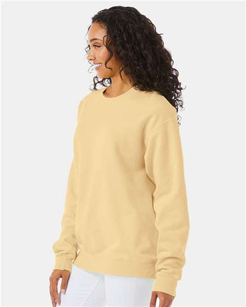 Pretreated ComfortWash GDH400 Unisex Garment-Dyed Crewneck Sweatshirt - Summer Squash Yellow - On Model - Side